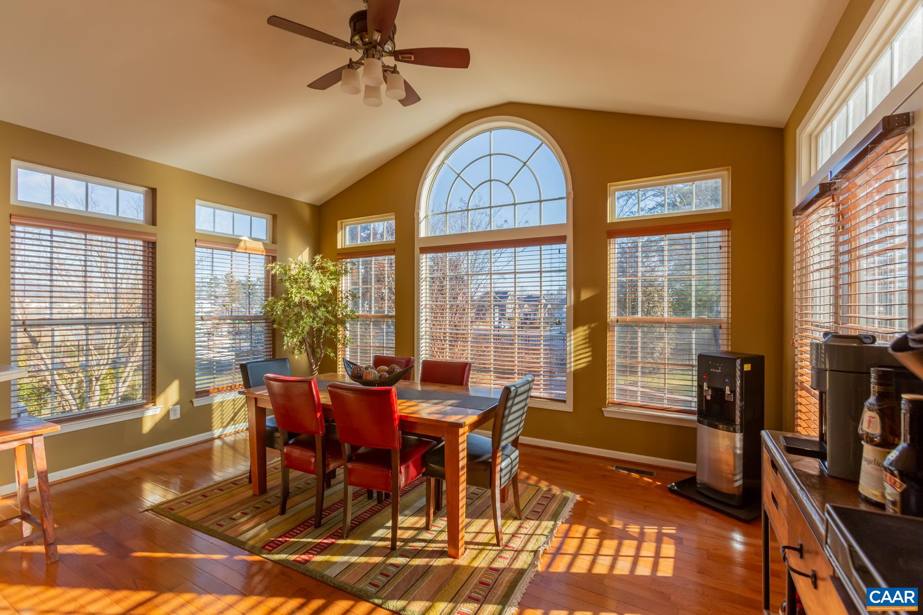 5384 Park Road Crozet, VA 22932 - Photo 5 of 10 a view of a dining room with furniture large windows and wooden floor