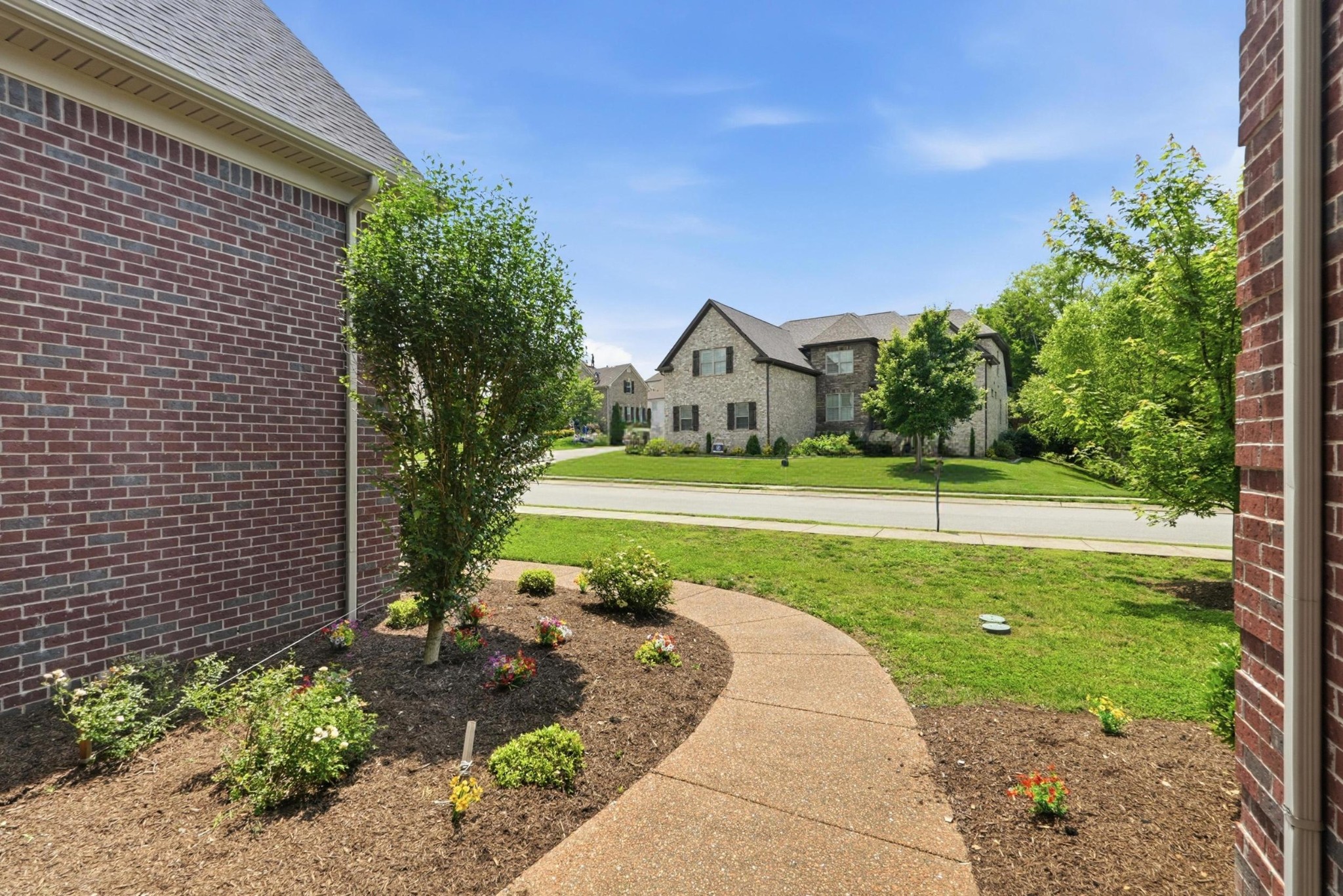 6000 Wallaby Court Spring Hill, TN 37174 - Photo 4 of 57 a view of a house with a big yard