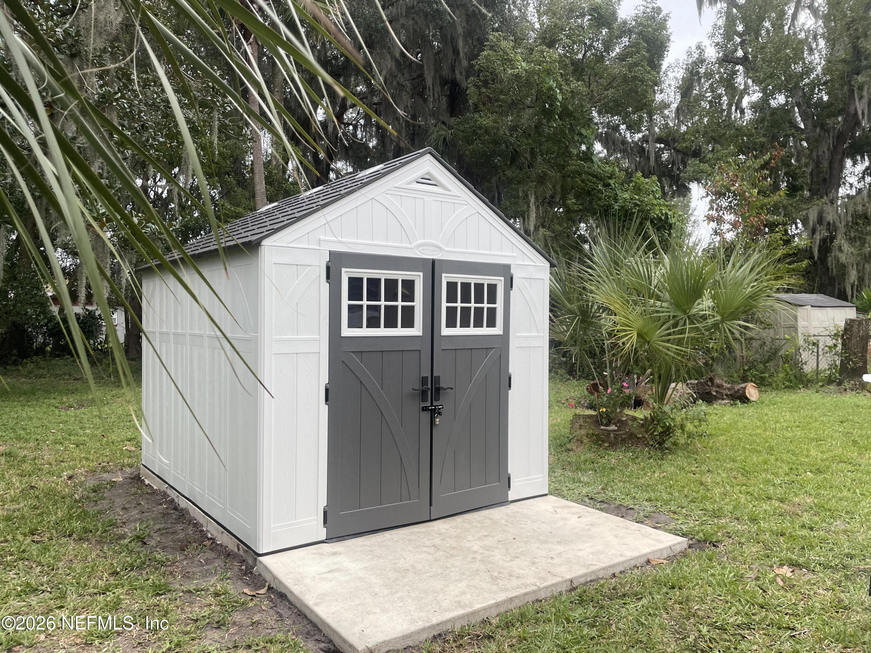 709 North 11th Street Palatka, FL 32177 - Photo 26 of 33 a view of a house with a yard