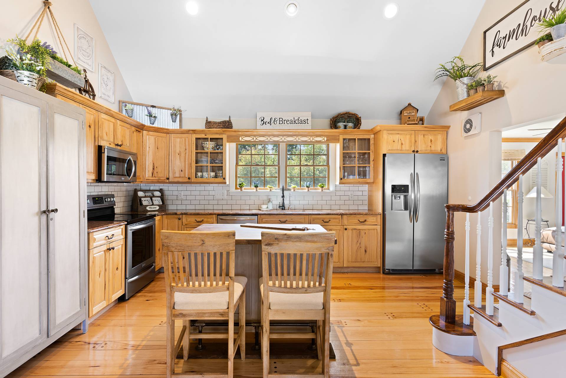 Undisclosed Address Remsenburg, NY 11960 - Photo 11 of 41 a kitchen with stainless steel appliances granite countertop a kitchen island hardwood floor and a sink