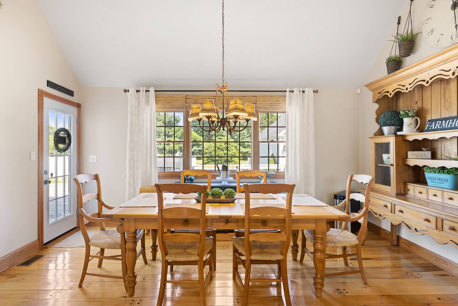 Undisclosed Address Remsenburg, NY 11960 - Photo 14 of 41 a view of a dining room with furniture window and wooden floor