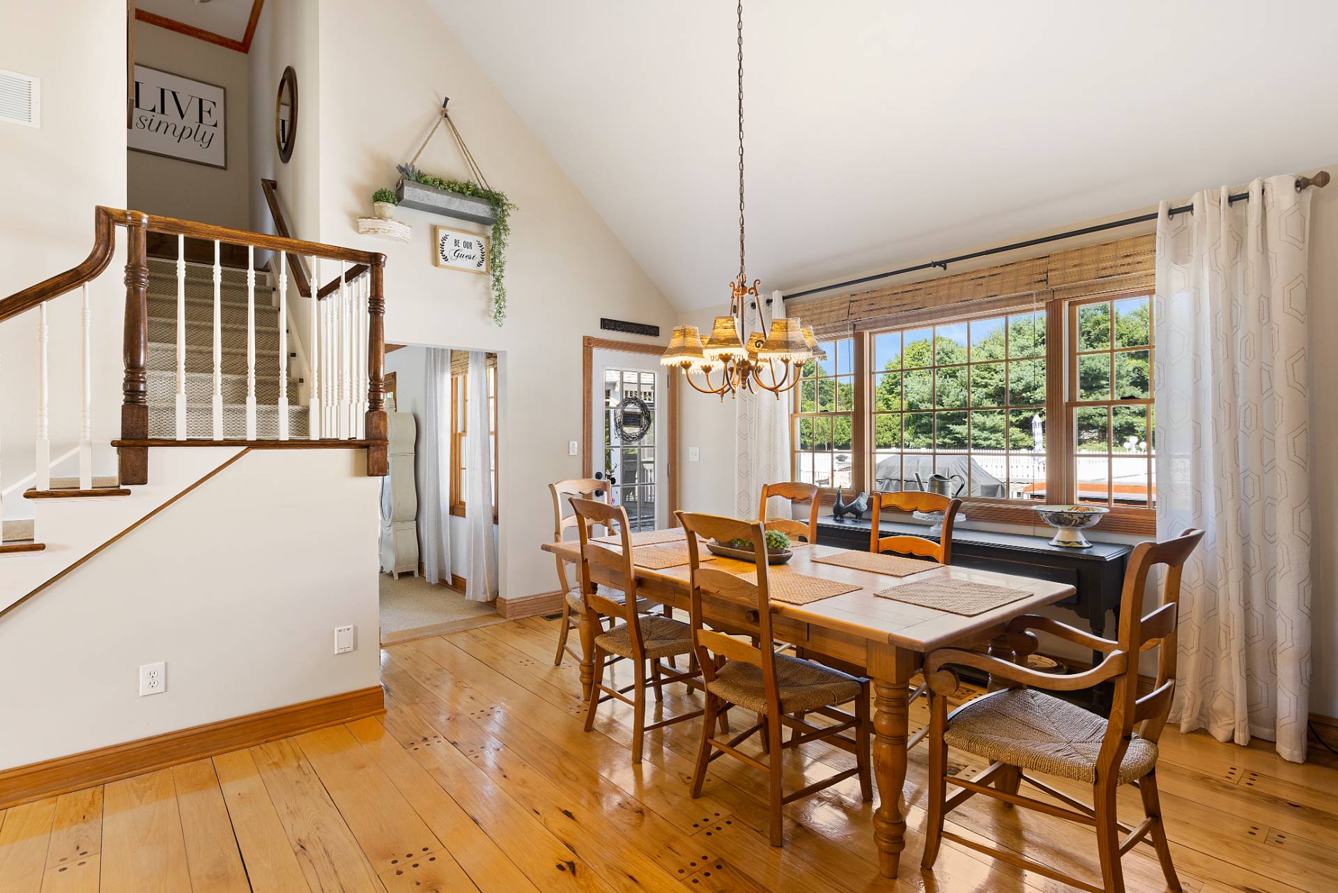 Undisclosed Address Remsenburg, NY 11960 - Photo 15 of 41 a view of a dining room with furniture window and wooden floor