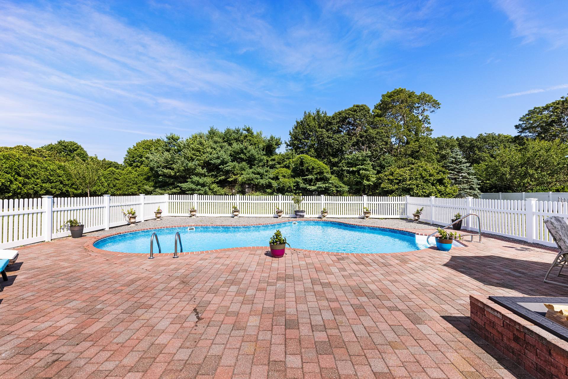 Undisclosed Address Remsenburg, NY 11960 - Photo 36 of 41 a view of a swimming pool with a lounge chair