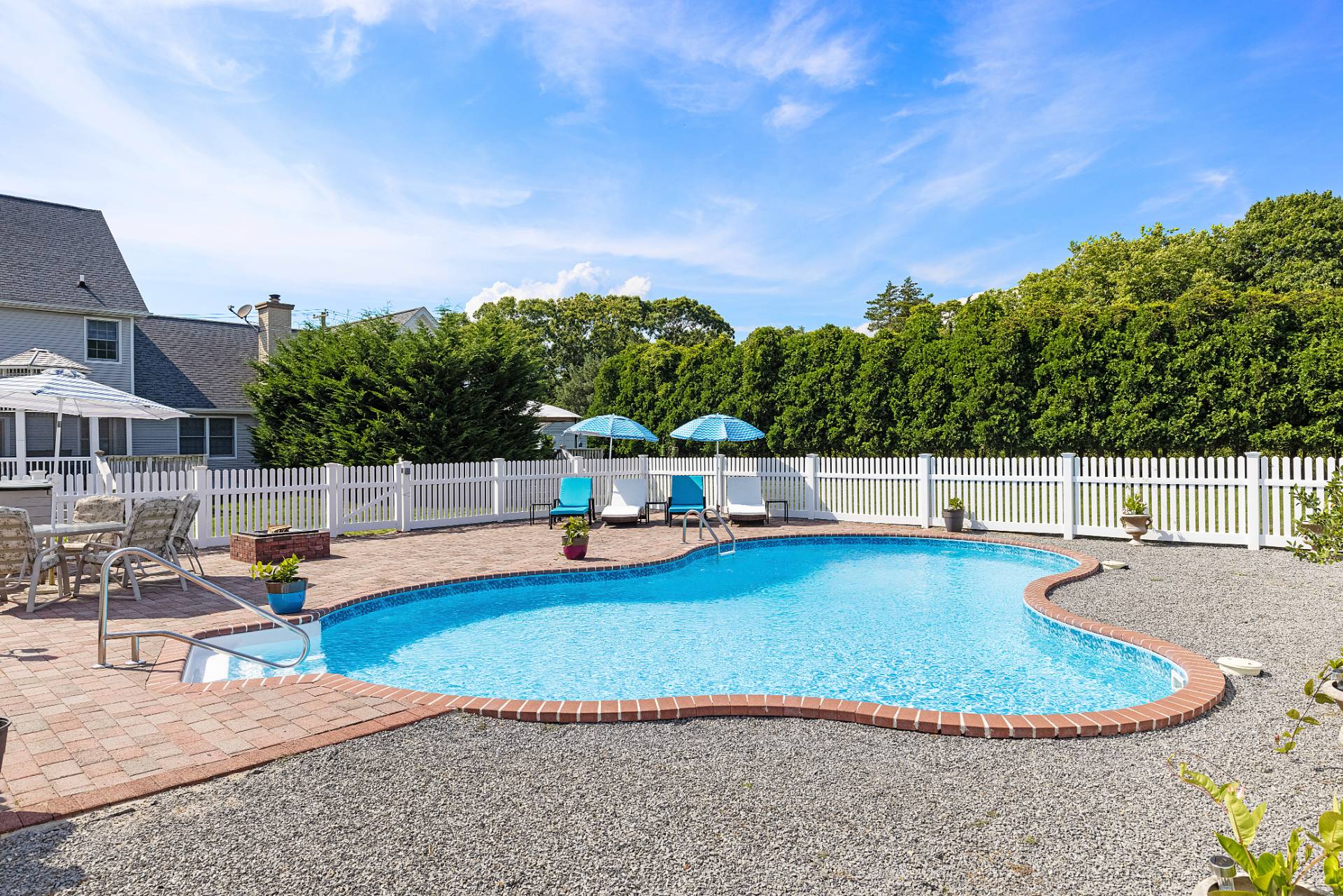 Undisclosed Address Remsenburg, NY 11960 - Photo 37 of 41 a view of a swimming pool with an outdoor seating