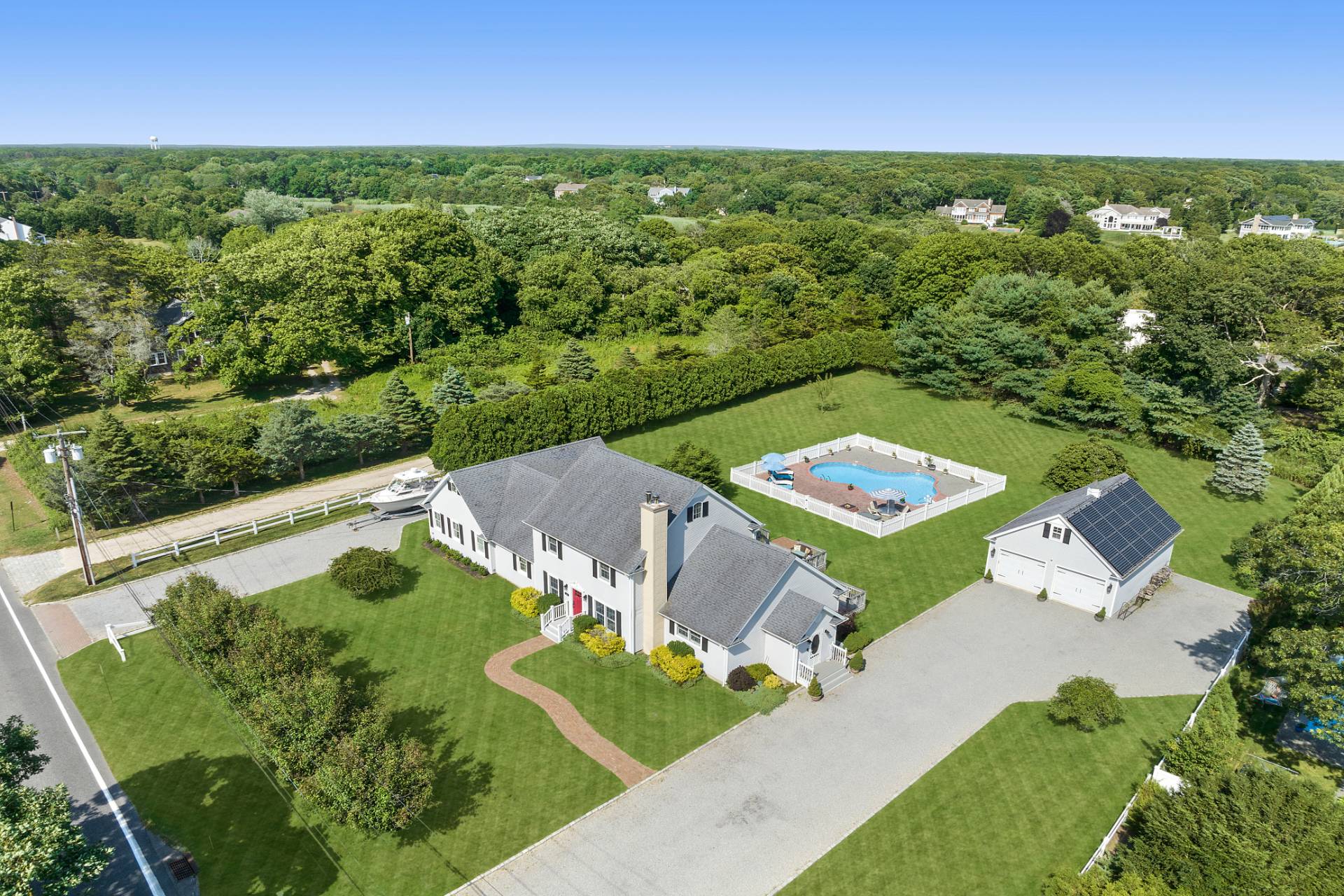 Undisclosed Address Remsenburg, NY 11960 - Photo 39 of 41 an aerial view of a house with a garden