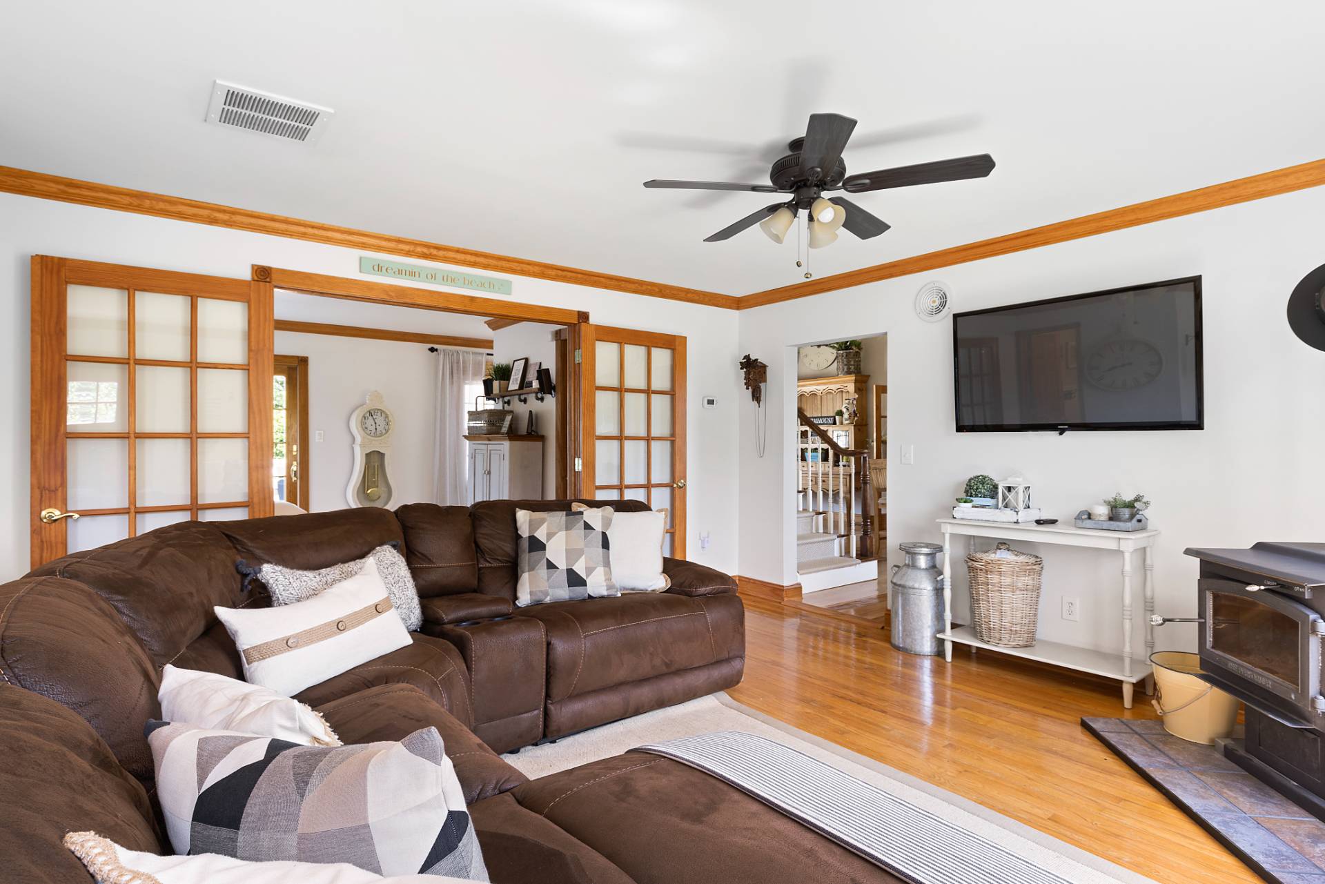 Undisclosed Address Remsenburg, NY 11960 - Photo 5 of 41 a living room with fireplace furniture and a flat screen tv