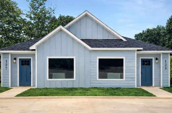 a view of front of house with garage