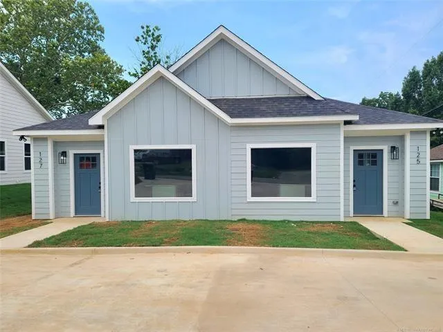 a view of outdoor space yard and front view of a house