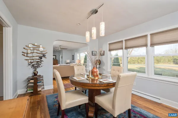 a kitchen with stainless steel appliances granite countertop a refrigerator sink and stove top oven