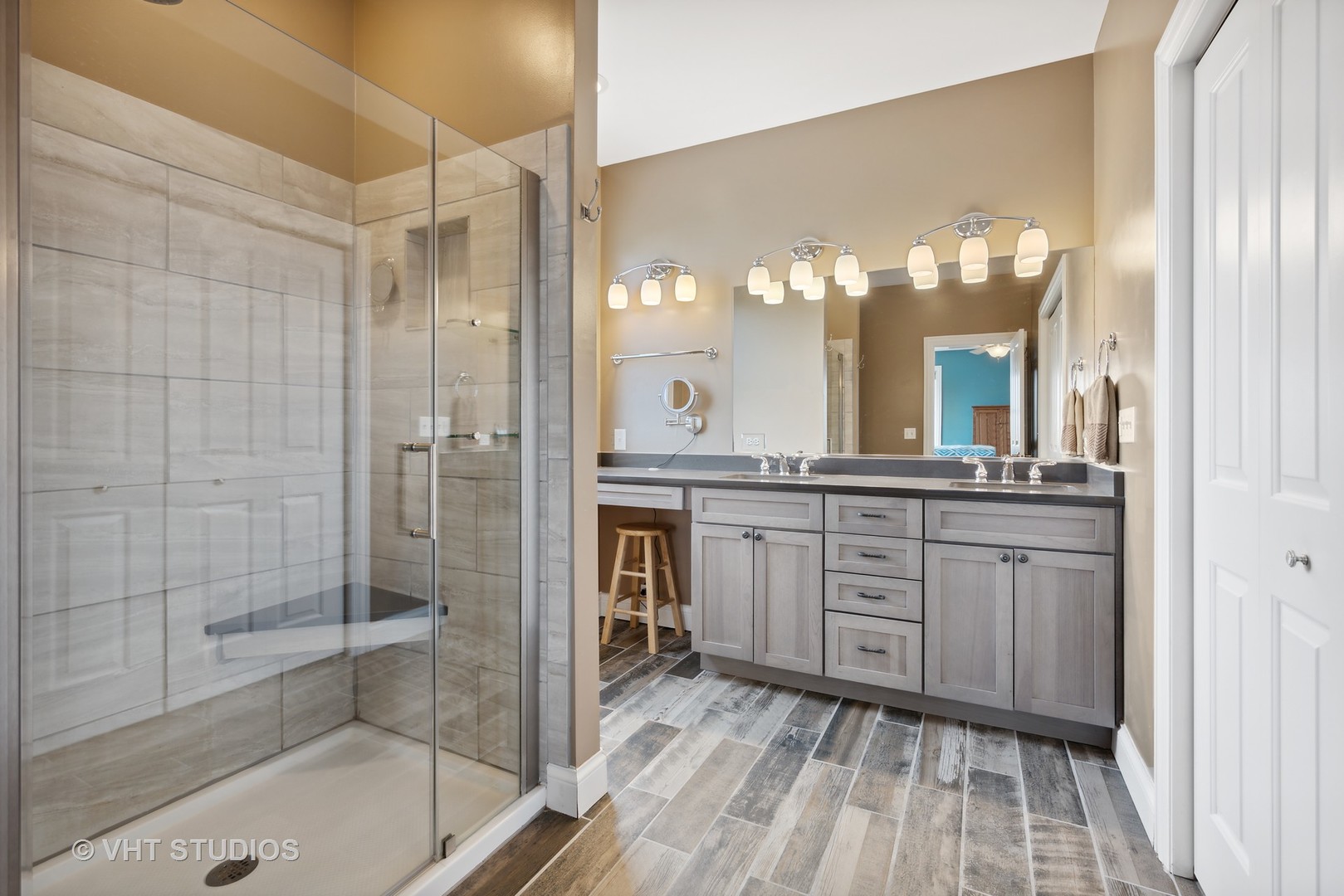41-w580 McDonald Road Elgin, IL 60124 - Photo 11 of 25 a spacious bathroom with a granite countertop sink mirror and shower