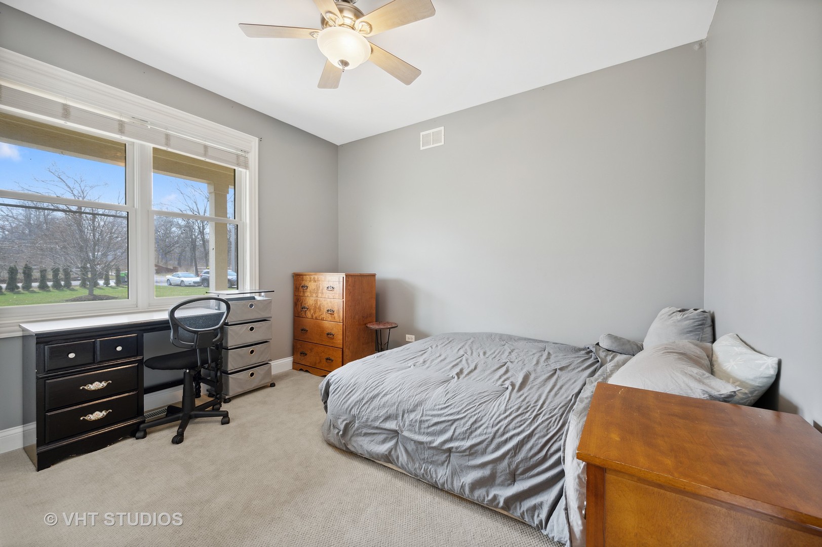 41-w580 McDonald Road Elgin, IL 60124 - Photo 12 of 25 a bedroom with a bed and wooden floor