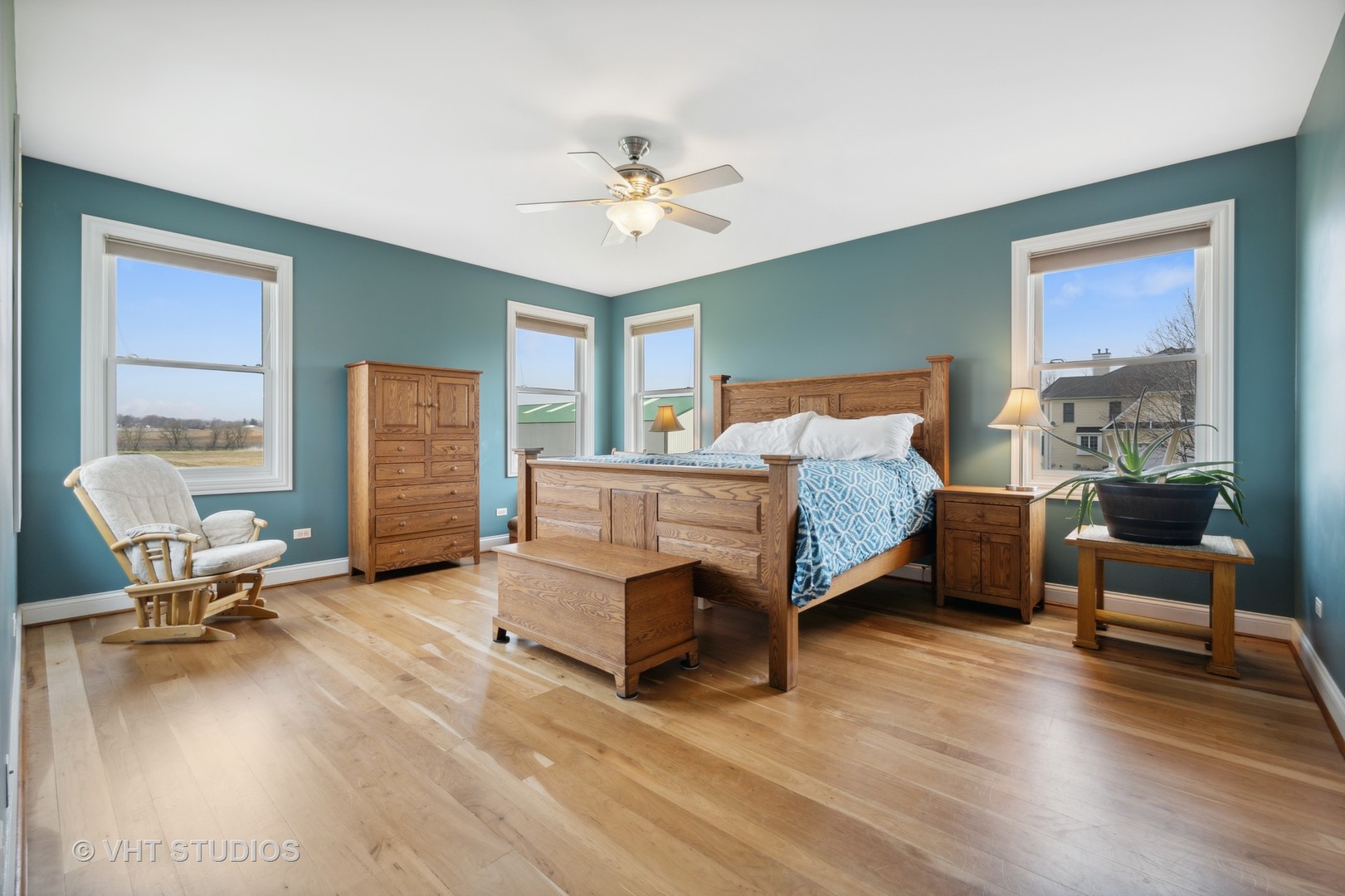 41-w580 McDonald Road Elgin, IL 60124 - Photo 10 of 25 a bedroom with a bed and wooden floor
