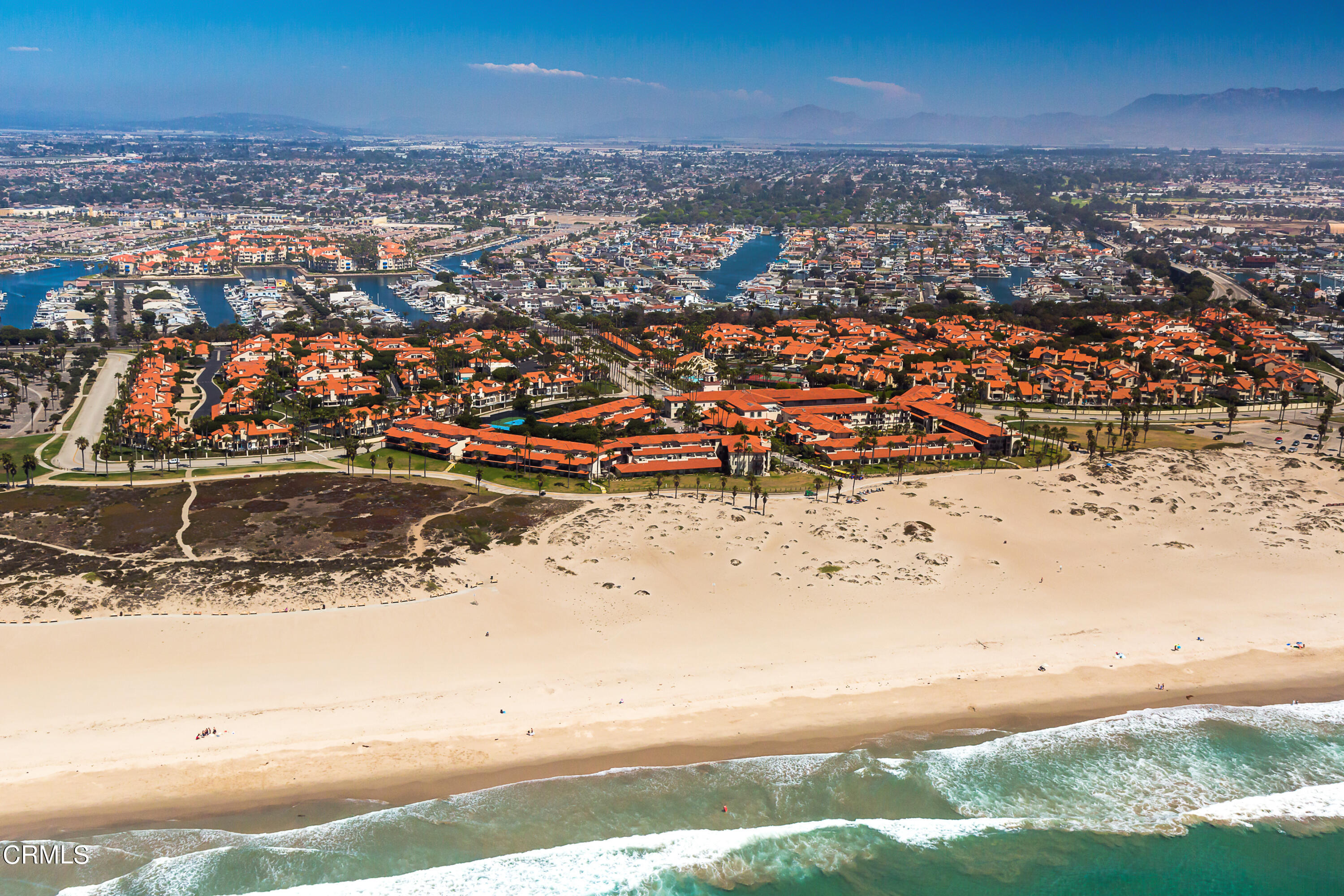 2263 Martinique Lane Oxnard, CA 93035 - Photo 1 of 38 an aerial view of residential building and ocean view
