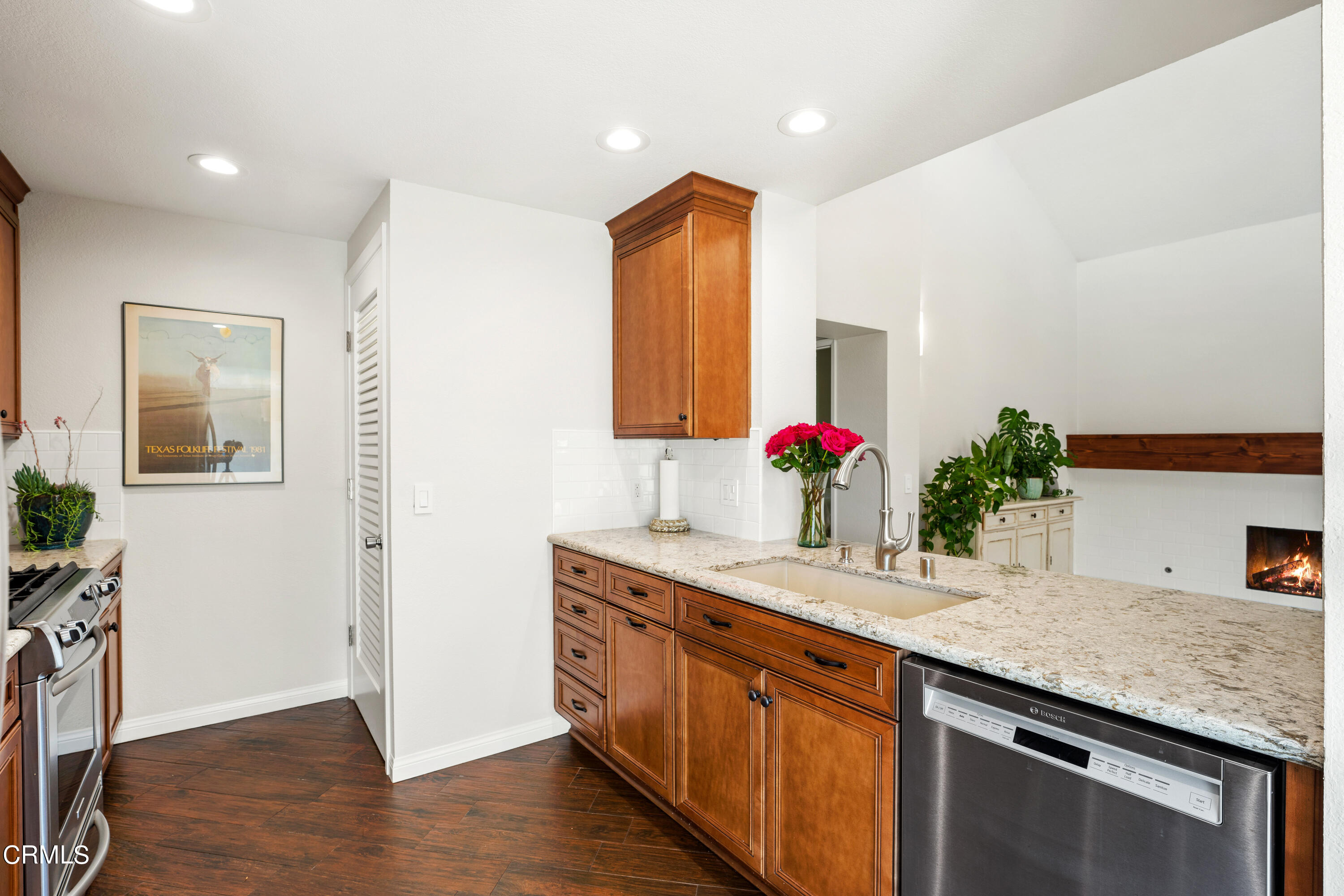 2263 Martinique Lane Oxnard, CA 93035 - Photo 11 of 38 a bathroom with a granite countertop sink and a mirror