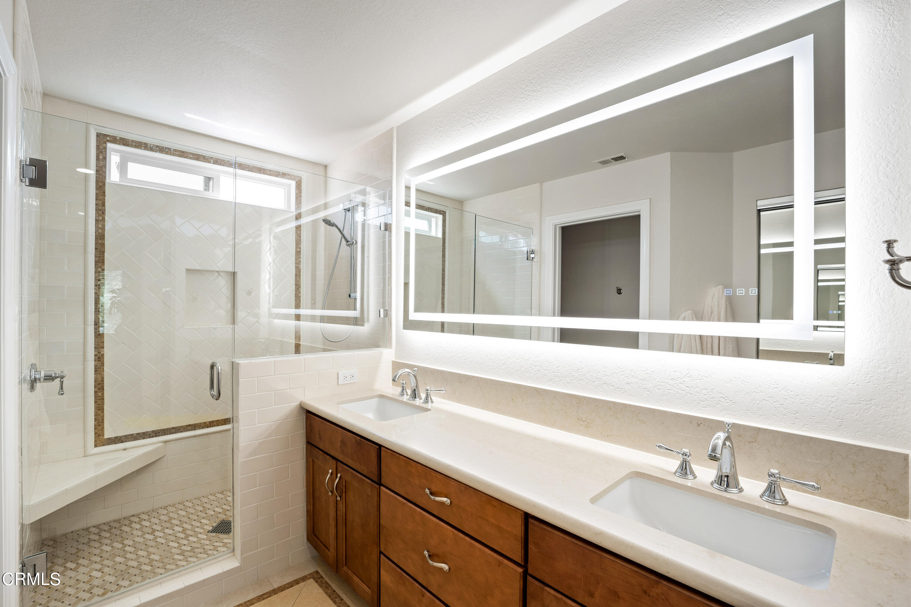 2263 Martinique Lane Oxnard, CA 93035 - Photo 18 of 38 a bathroom with a double vanity sink mirror and double