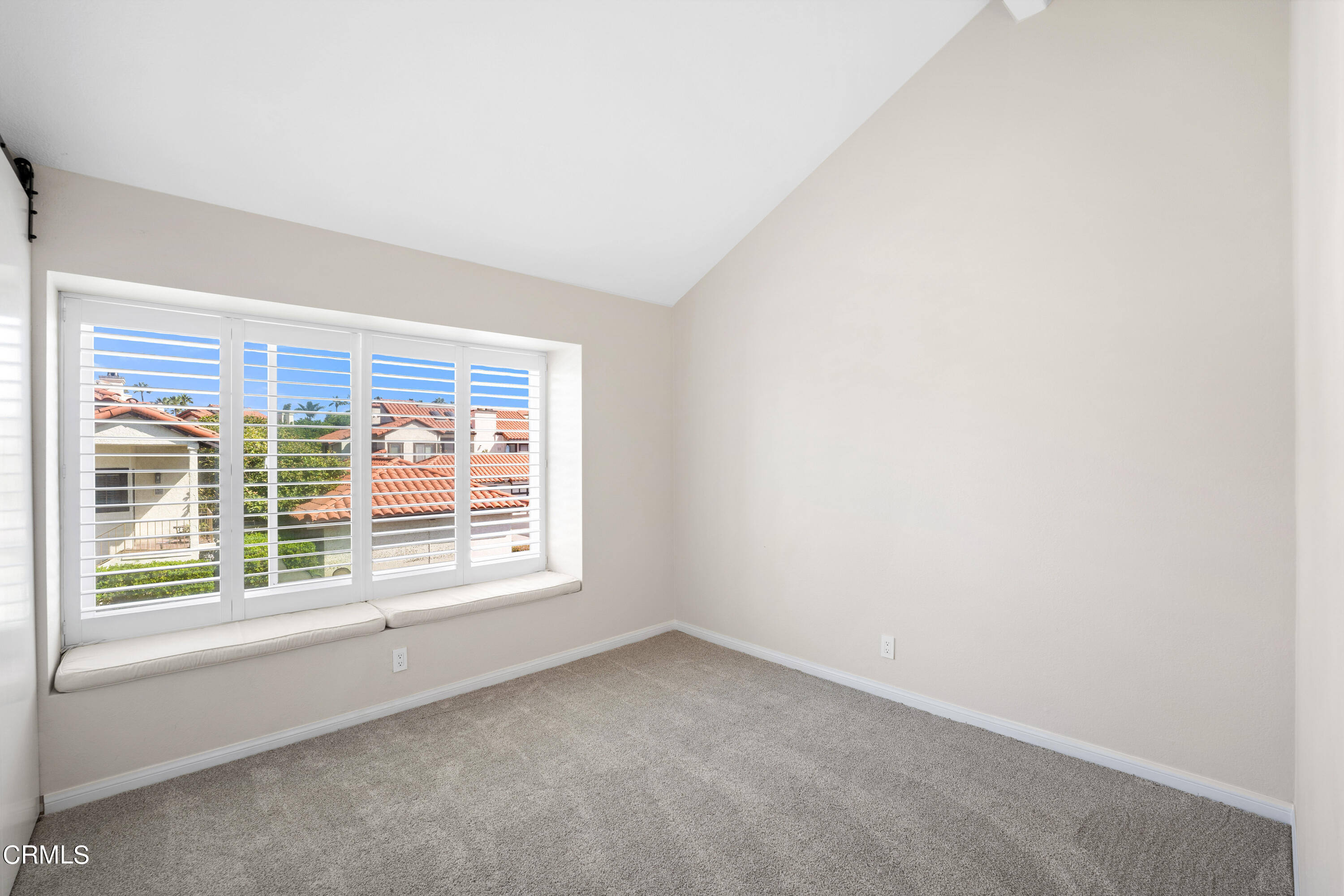 2263 Martinique Lane Oxnard, CA 93035 - Photo 20 of 38 a view of an empty room with a window