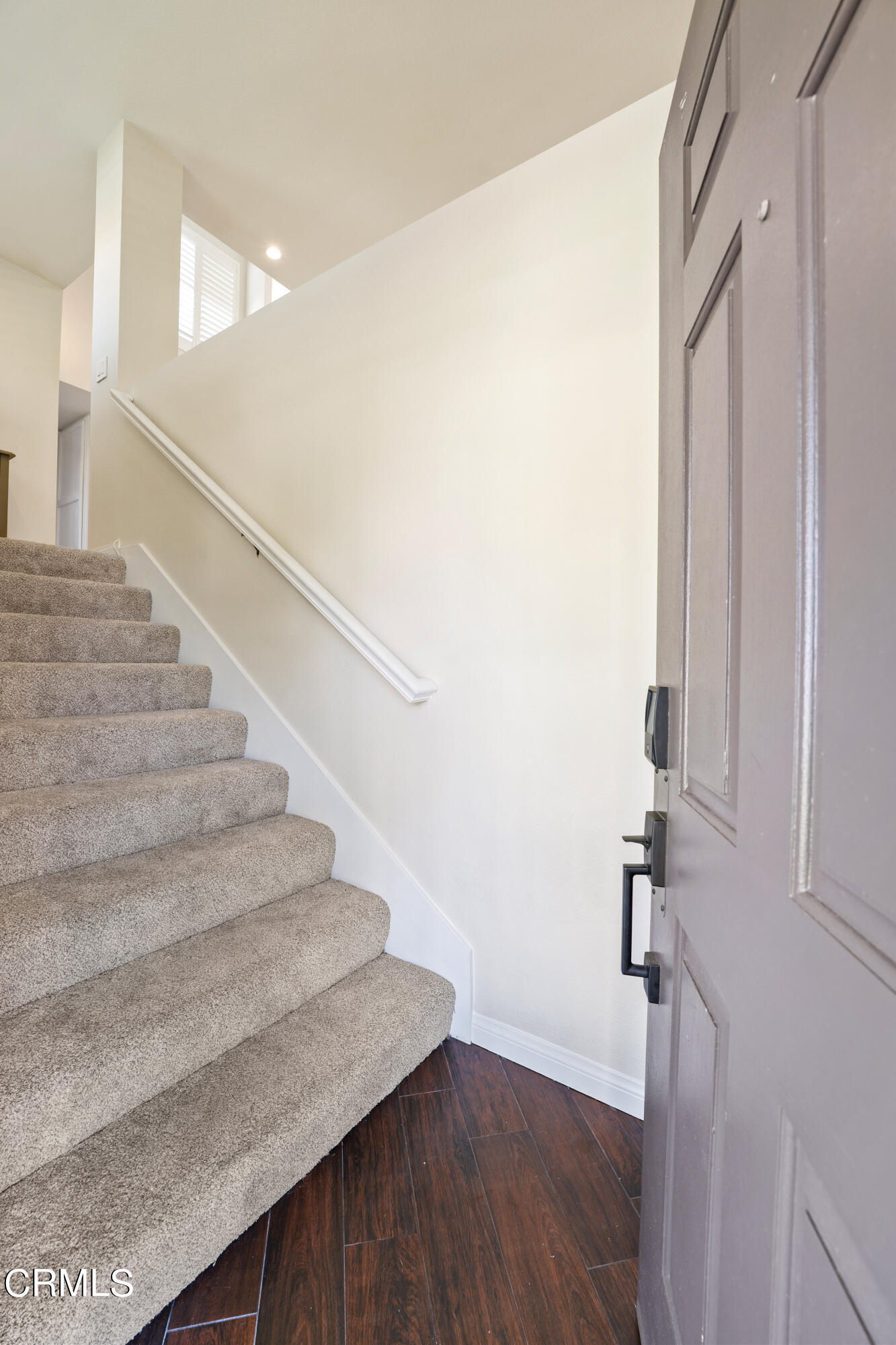 2263 Martinique Lane Oxnard, CA 93035 - Photo 4 of 38 a view of entryway and hall with wooden floor