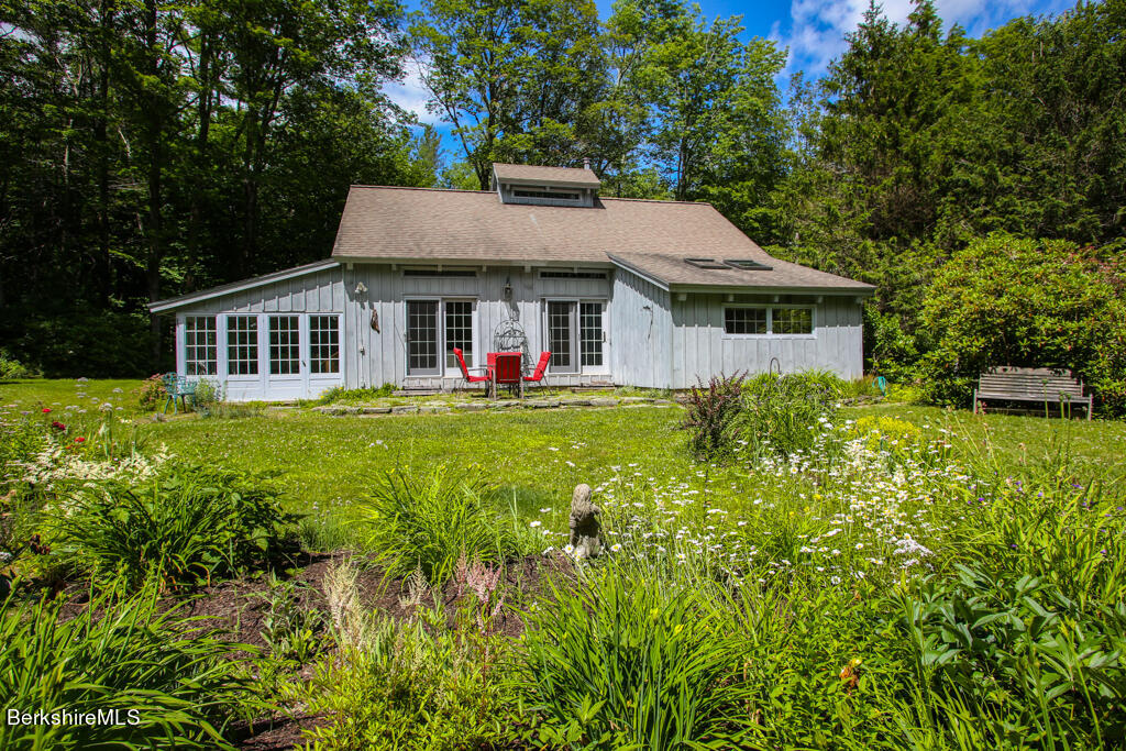 544 Tunnel Road Rowe, MA 01367 - Photo 3 of 32 a front view of a house with a yard