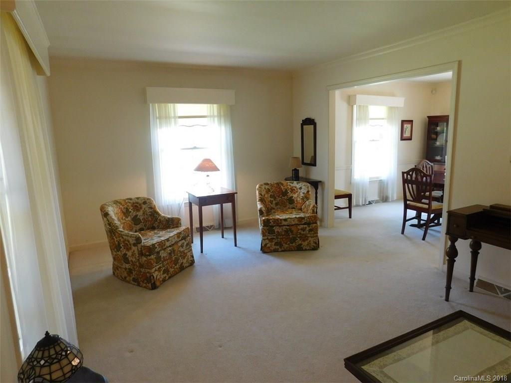 6311 Lake Forest Road East Charlotte, NC 28227 - Photo 12 of 31 a living room with furniture and a window