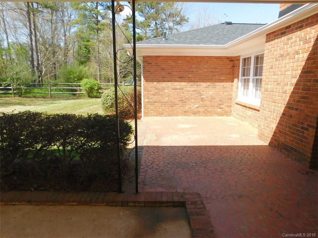 6311 Lake Forest Road East Charlotte, NC 28227 - Photo 4 of 31 a view of ocean from a balcony