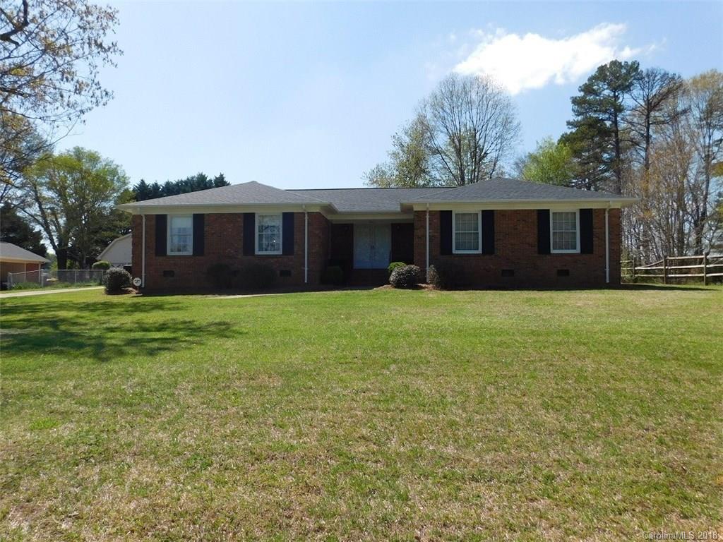 6311 Lake Forest Road East Charlotte, NC 28227 - Photo 31 of 31 a front view of house with yard and green space