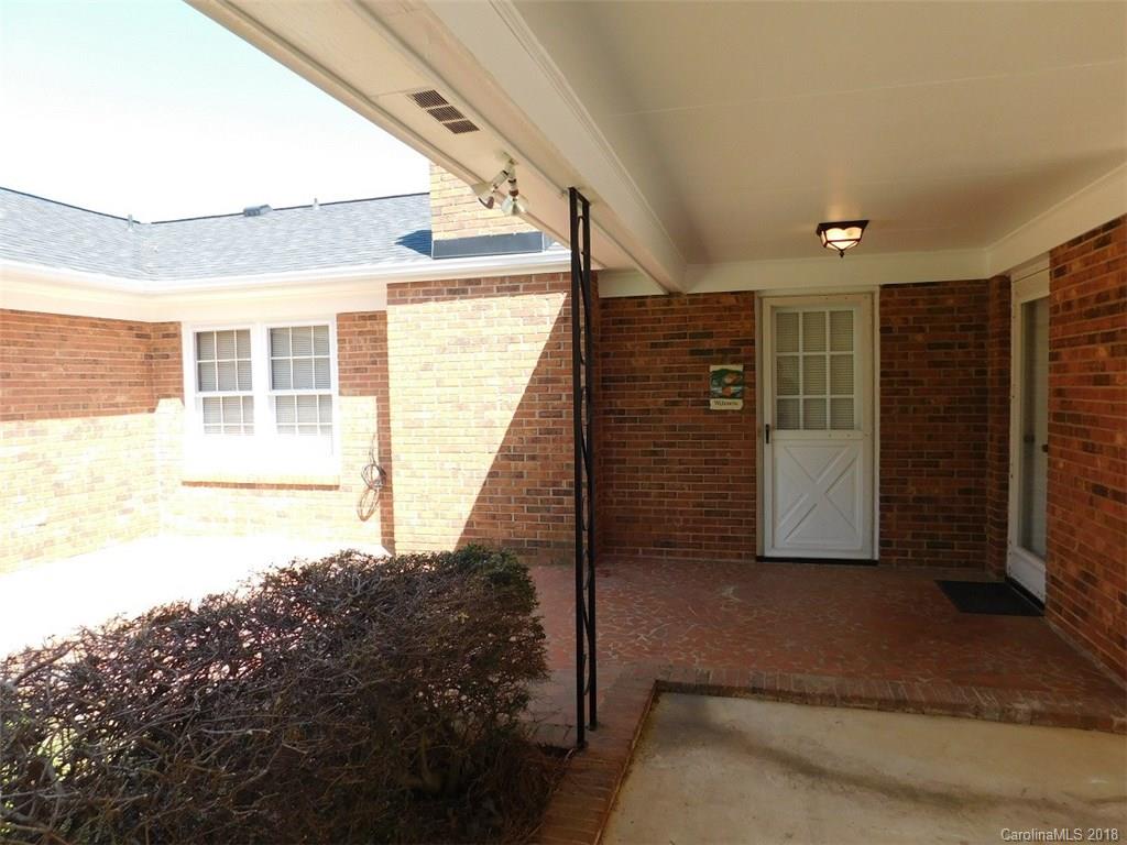 6311 Lake Forest Road East Charlotte, NC 28227 - Photo 5 of 31 a view of house with stairs