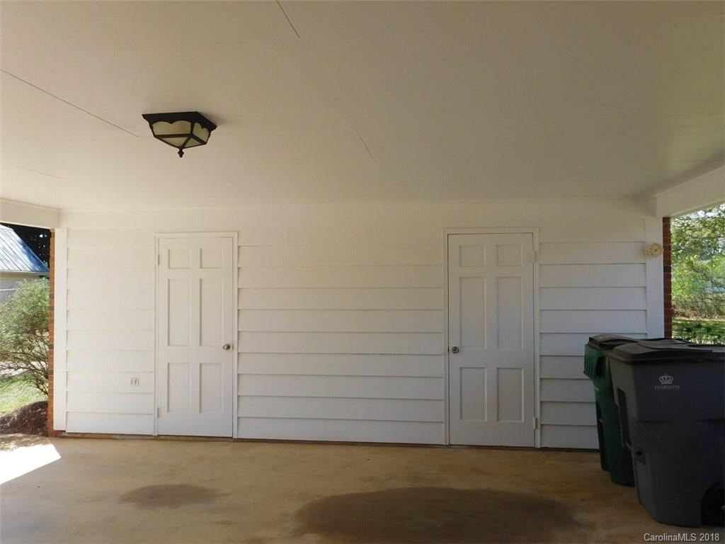 6311 Lake Forest Road East Charlotte, NC 28227 - Photo 10 of 31 an empty room with windows