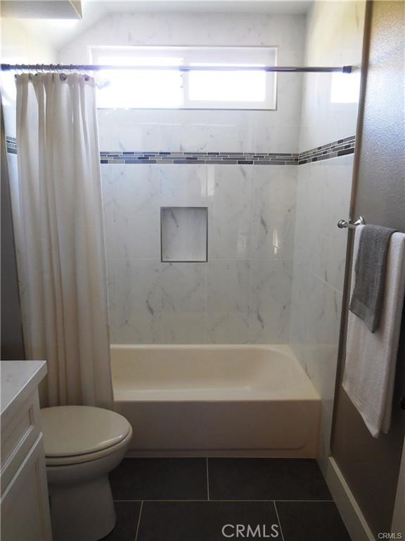 26082 Rio Grande Avenue Laguna Hills, CA 92653 - Photo 24 of 29 a bathroom with a toilet and a bathtub