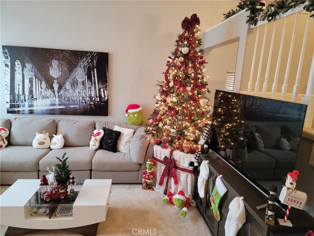 26082 Rio Grande Avenue Laguna Hills, CA 92653 - Photo 25 of 29 a living room with furniture and a christmas tree