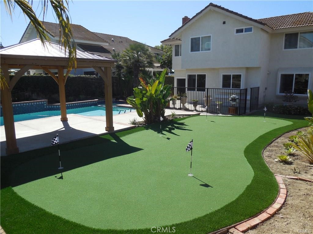 26082 Rio Grande Avenue Laguna Hills, CA 92653 - Photo 9 of 29 a view of a house with backyard