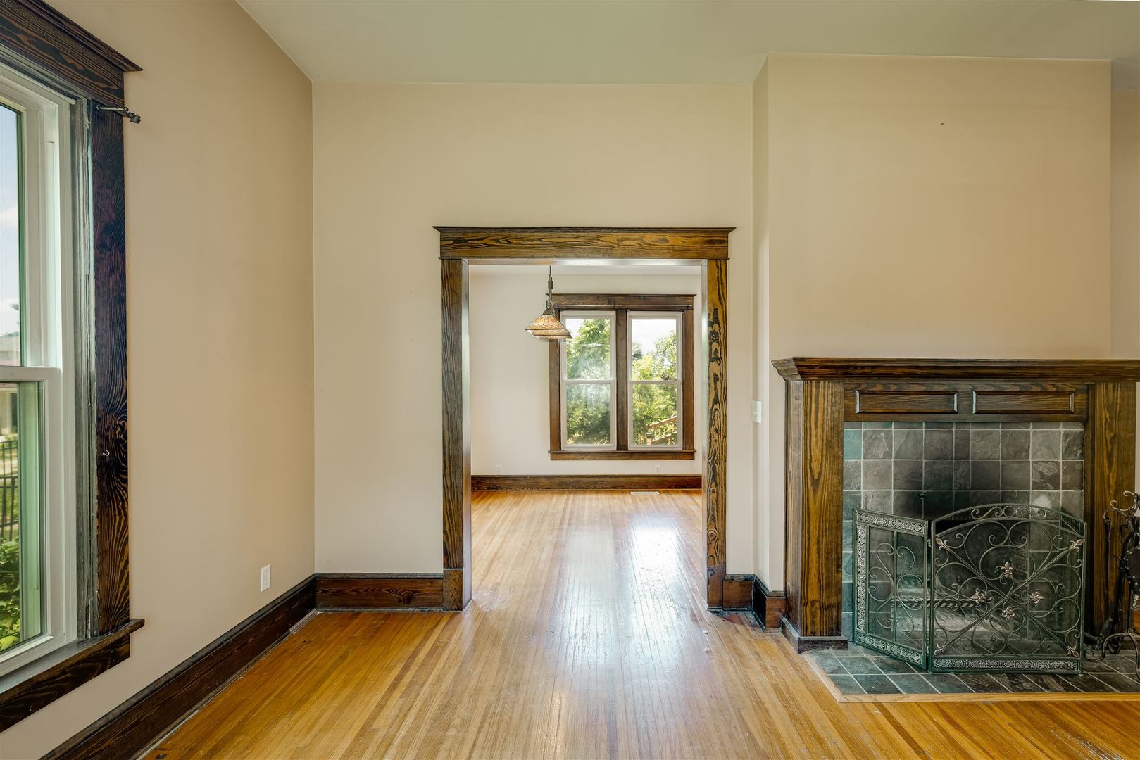 301 West Cooper Street Colfax, IL 61728 - Photo 12 of 69 a view of a room with wooden floor and a wooden door