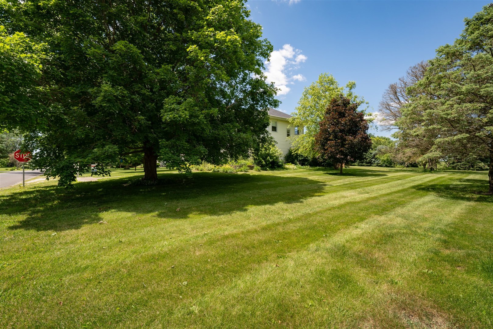 301 West Cooper Street Colfax, IL 61728 - Photo 36 of 69 a view of a golf course with a lake