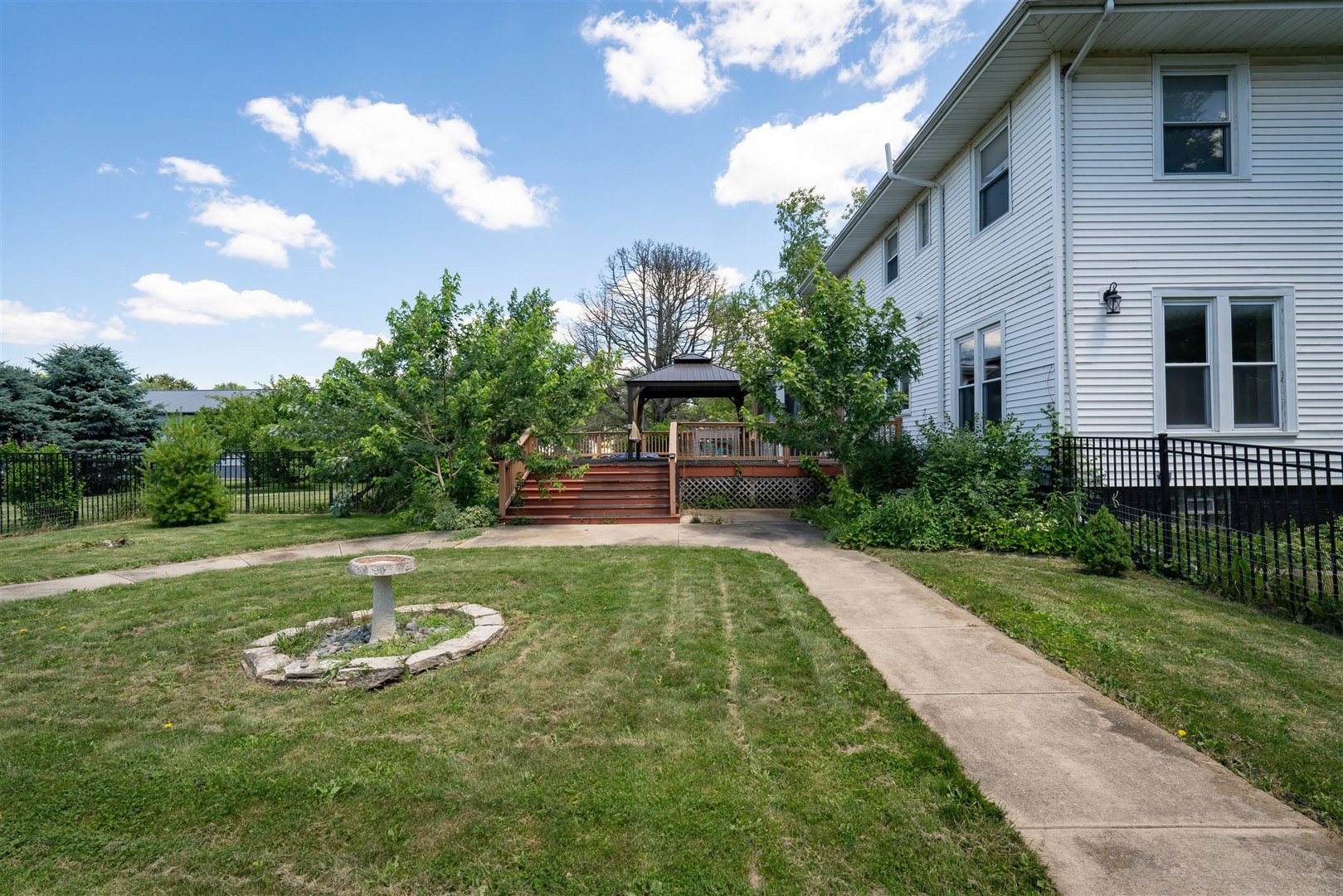 301 West Cooper Street Colfax, IL 61728 - Photo 46 of 69 a front view of a house with a yard