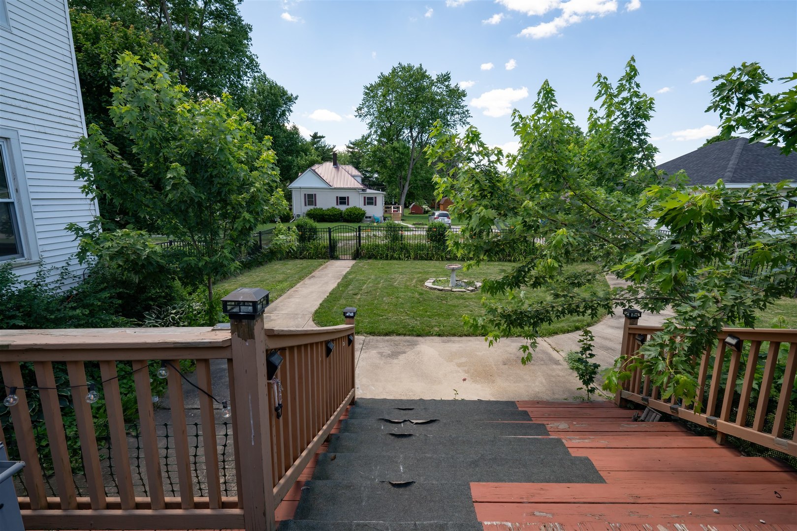 301 West Cooper Street Colfax, IL 61728 - Photo 48 of 69 a view of a balcony with wooden floor