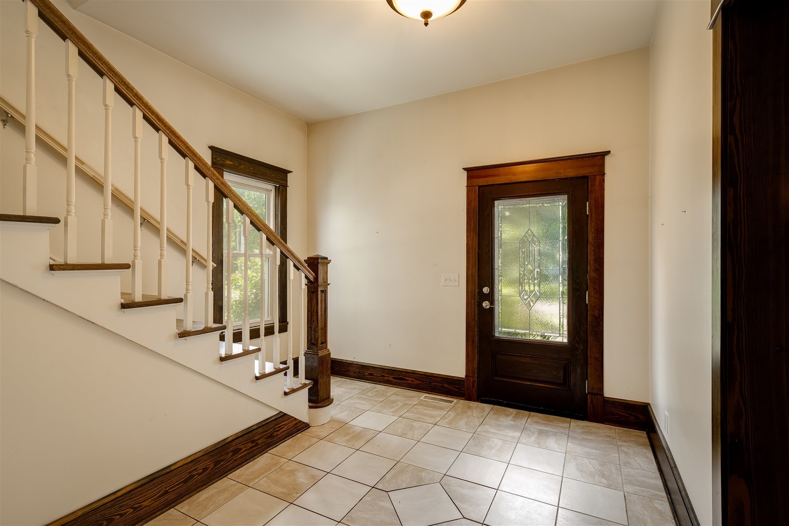 301 West Cooper Street Colfax, IL 61728 - Photo 5 of 69 a view of an entryway with staircase