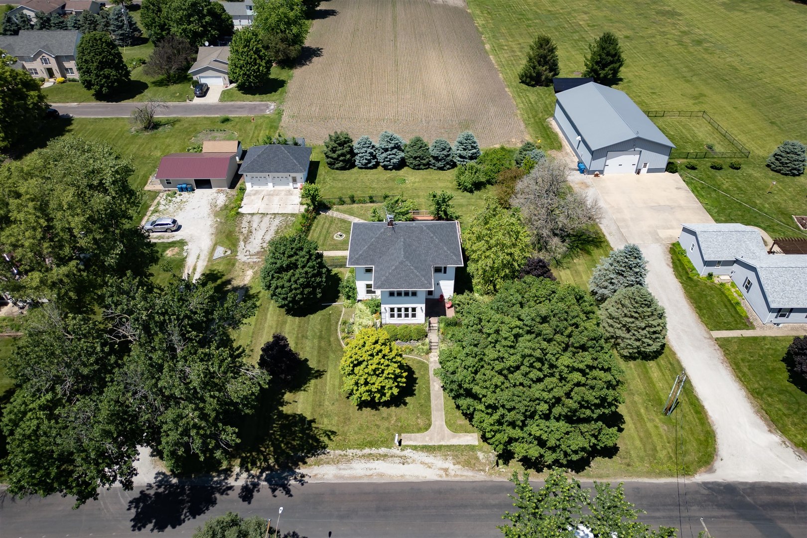 301 West Cooper Street Colfax, IL 61728 - Photo 55 of 69 an aerial view of a house