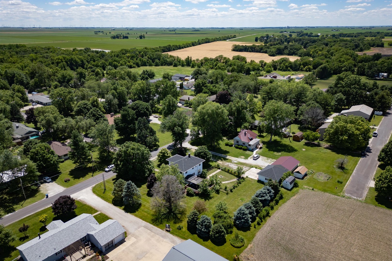 301 West Cooper Street Colfax, IL 61728 - Photo 60 of 69 an aerial view of multiple house