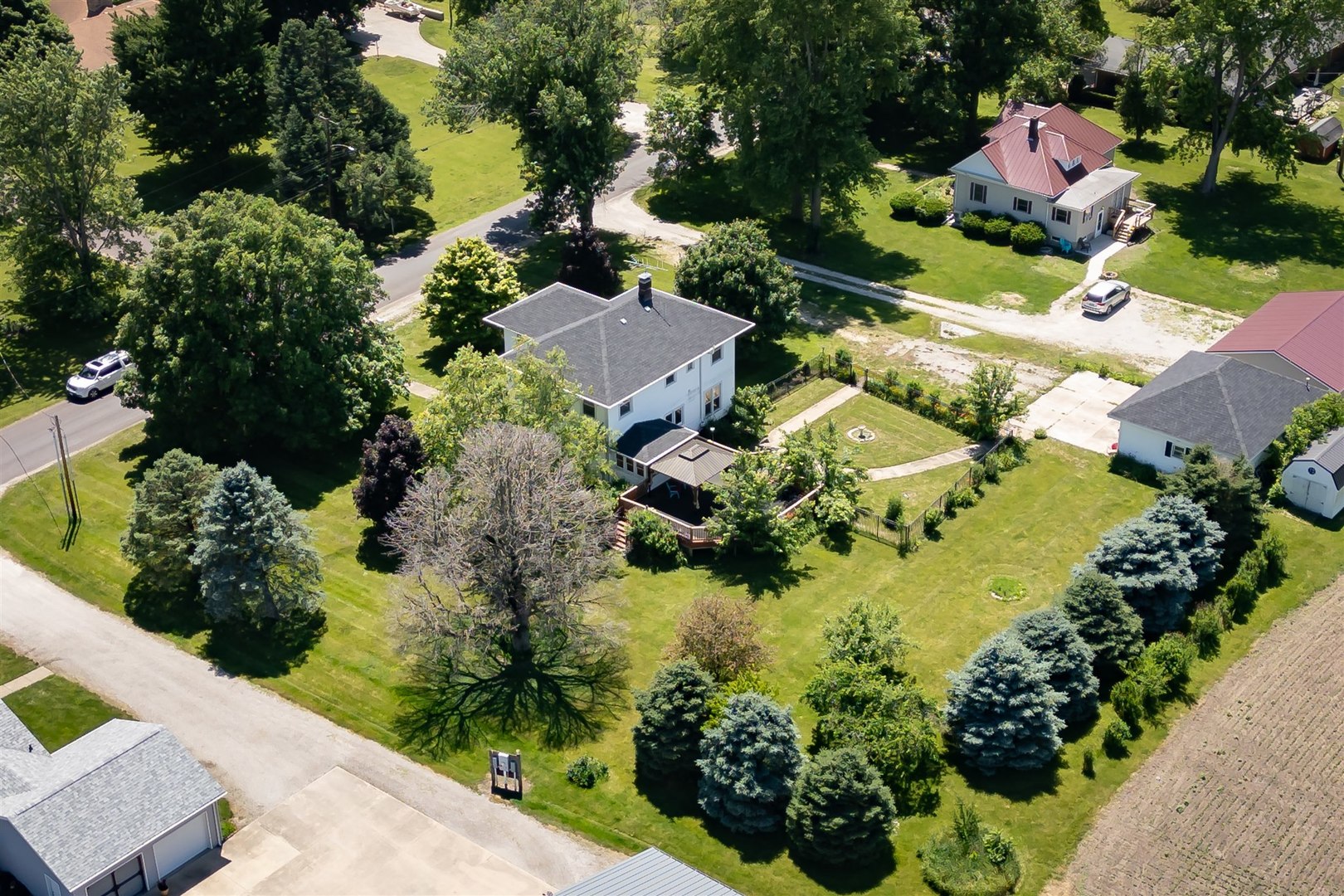 301 West Cooper Street Colfax, IL 61728 - Photo 61 of 69 an aerial view of residential house with yard and swimming pool