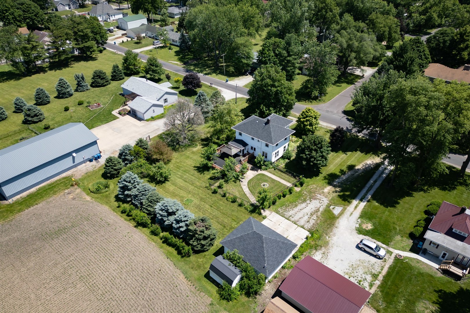 301 West Cooper Street Colfax, IL 61728 - Photo 66 of 69 an aerial view of a house with a yard