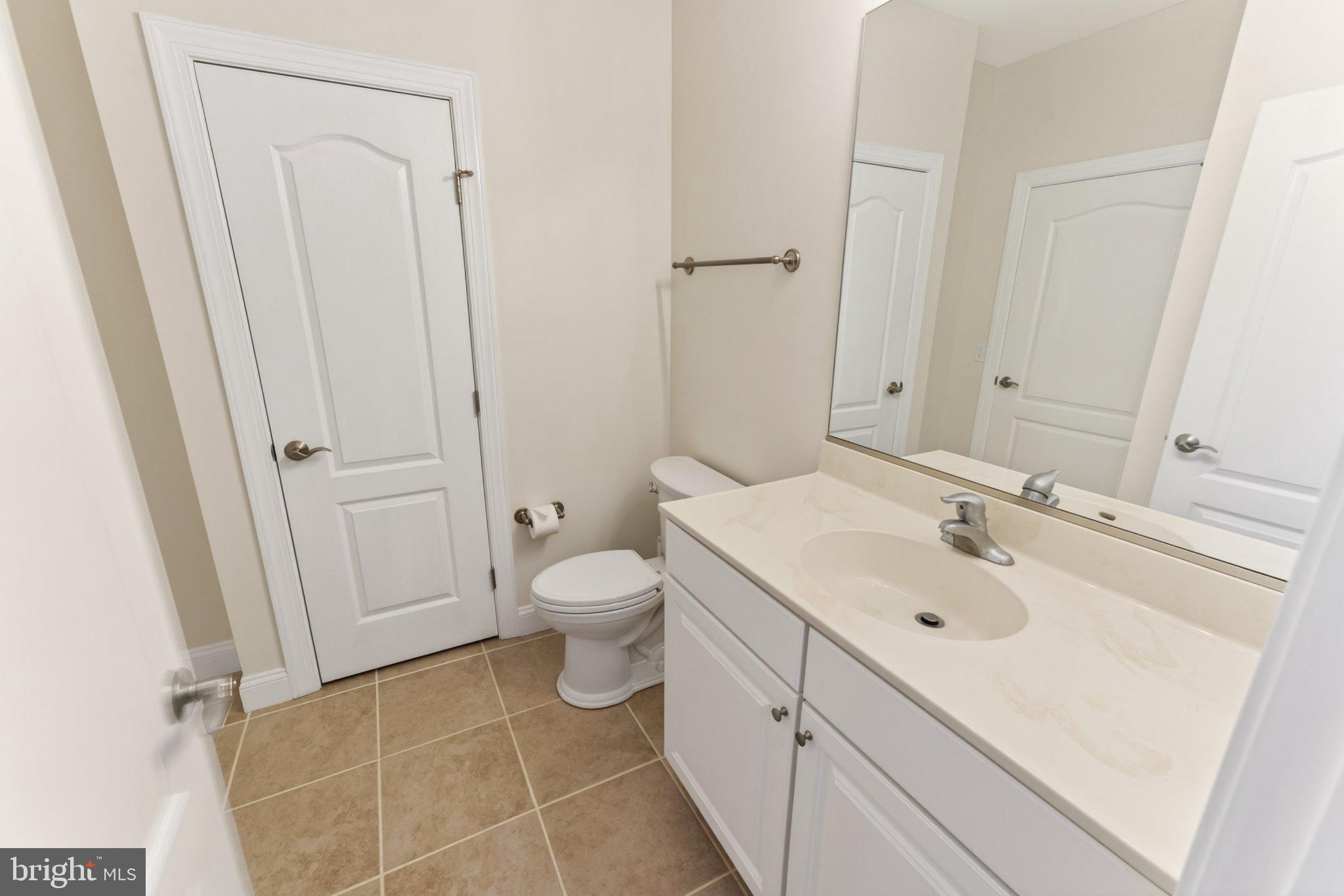 34029 Peppers Corner Road Millville, DE 19967 - Photo 39 of 101 Modern bathroom with sleek finishes.