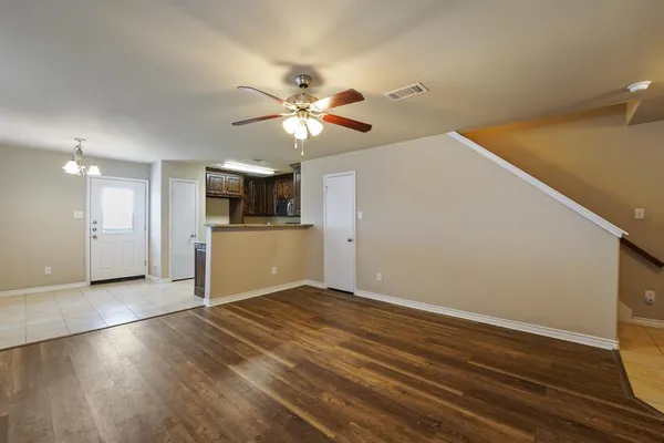 a view of a kitchen with a dishwasher cabinets and a kitchen