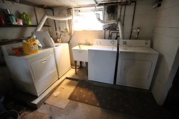 a utility room with dryer and washer