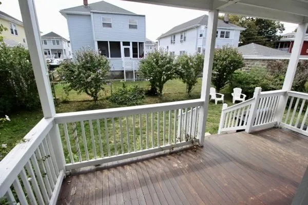 a view of a street from a balcony