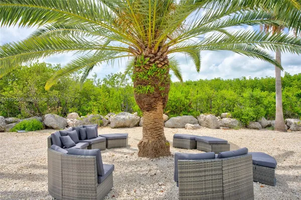 a view of a house with a street