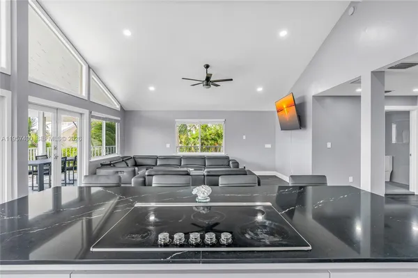 a view of swimming pool with seating area