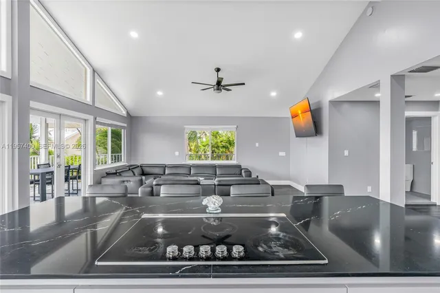 a view of swimming pool with seating area