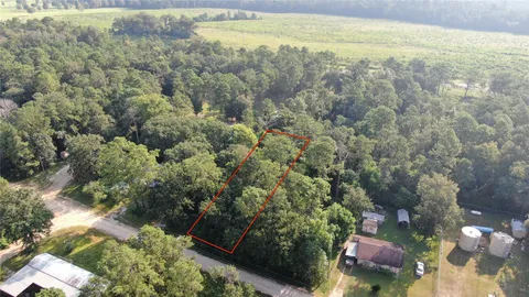 a view of a city street from a yard