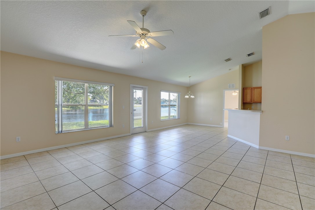 113 Drake Way Sebastian, FL 32958 - Photo 11 of 36 a view of an empty room with a window