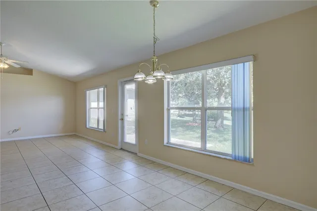 a view of livingroom with window and hardwood floor