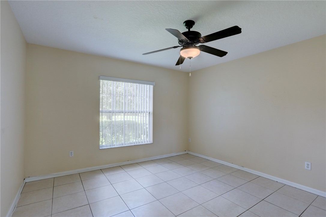 113 Drake Way Sebastian, FL 32958 - Photo 16 of 36 a view of an empty room with a window